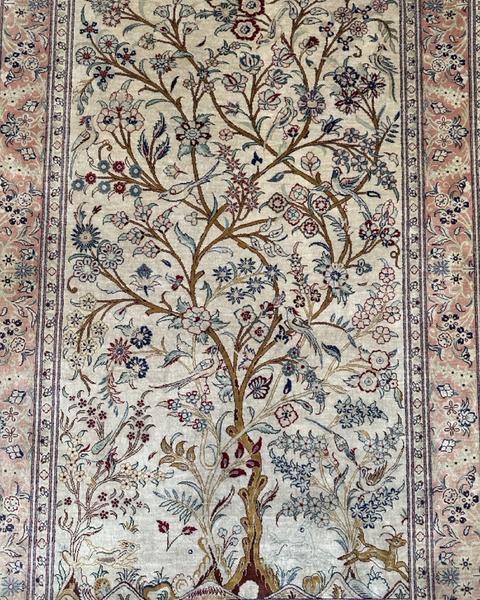 Tapis Qom en soie après restauration