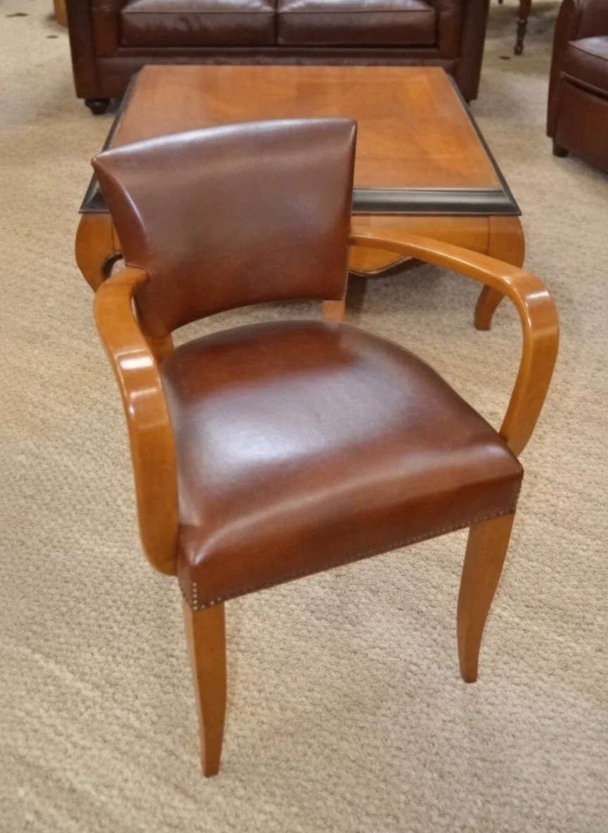 Restauration de fauteuil club en cuir