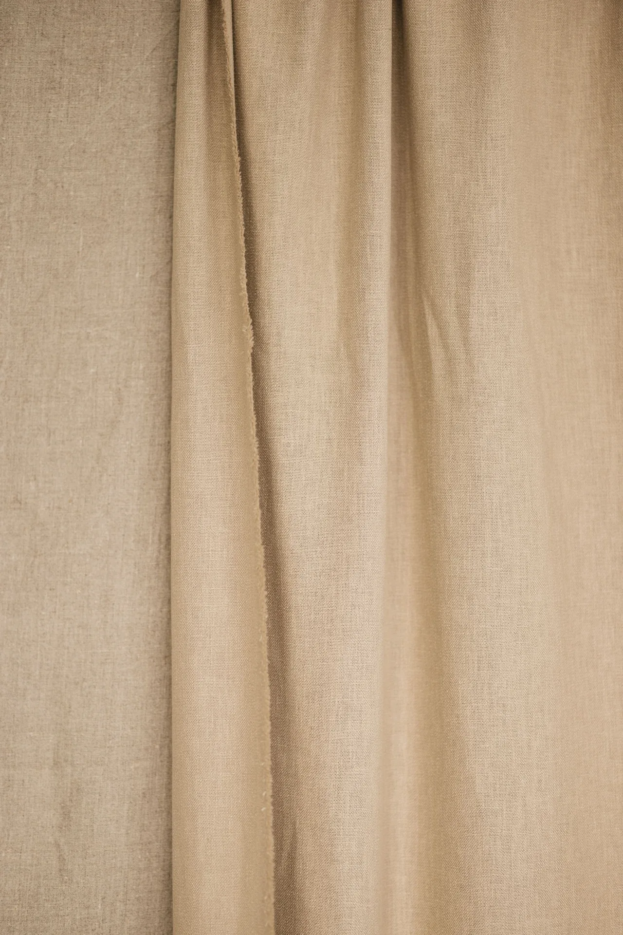 Détail d'un rideau de lin beige